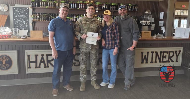 Hero-Hunts team members pose with Dover First Sergeants while presenting a donation from the foundation