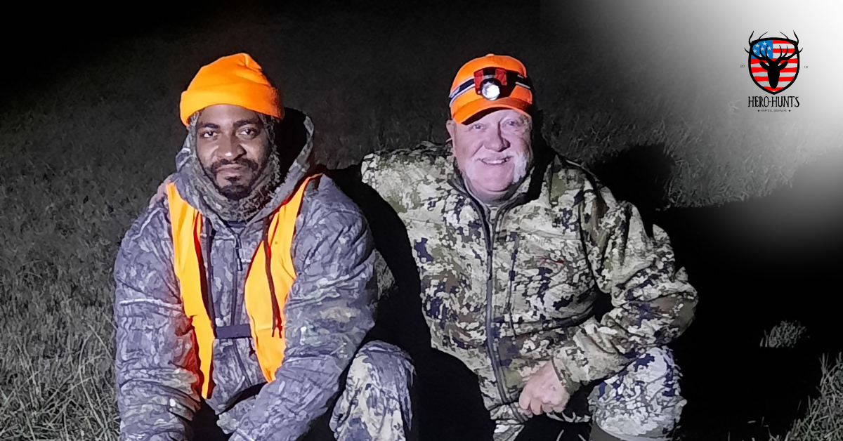 A volunteer hunting guide poses with a hunter on the 2025 Hunt